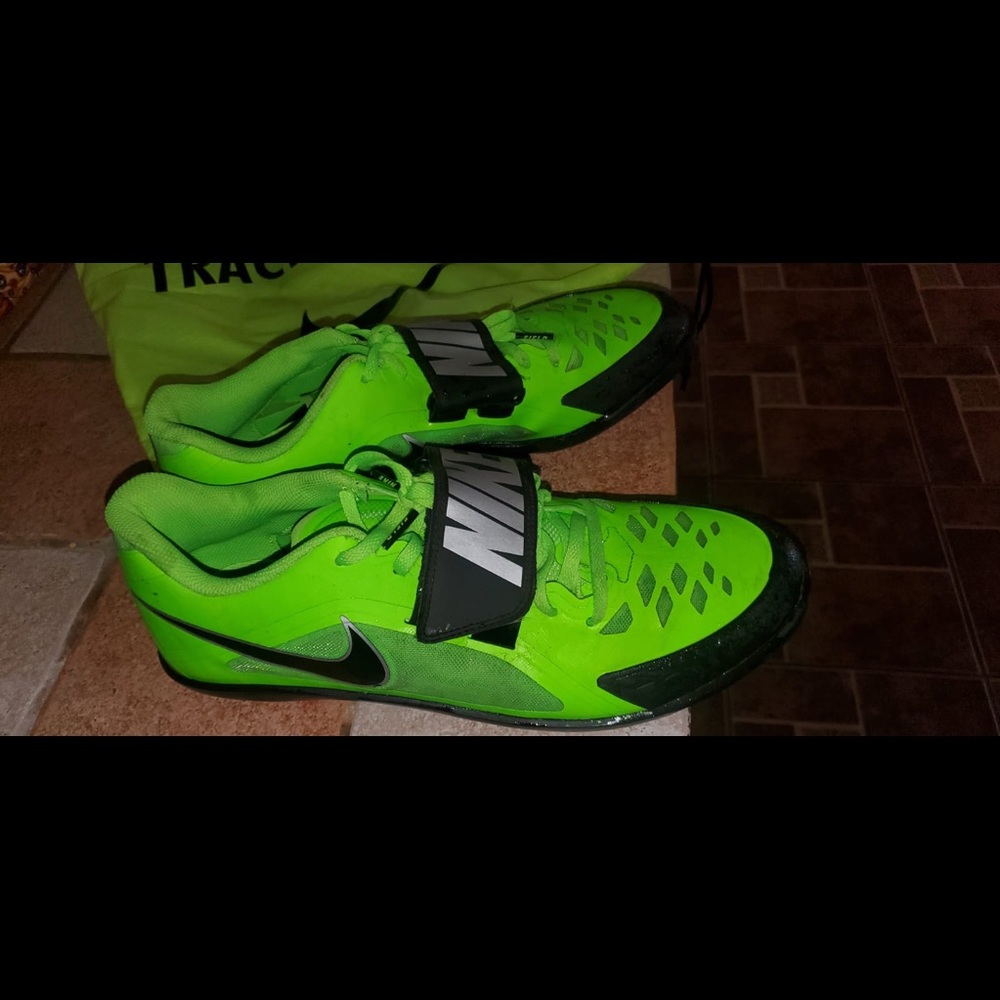 Nike green track shoes